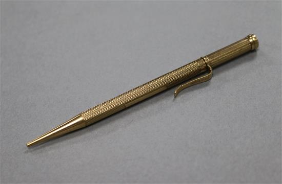 A 1920s engine turned 9ct gold propelling pencil by Sampson Mordan & Co, 11.2cm.